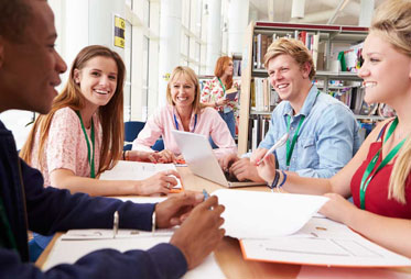 Students sitting at desk studying